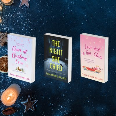 Three book covers surrounded by Christmas candles and dried fruit